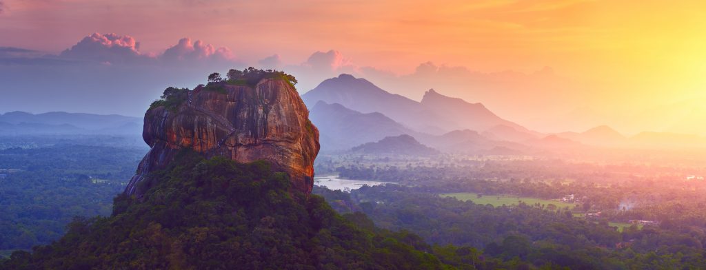 A landscape image of a sunset in Sri Lanka